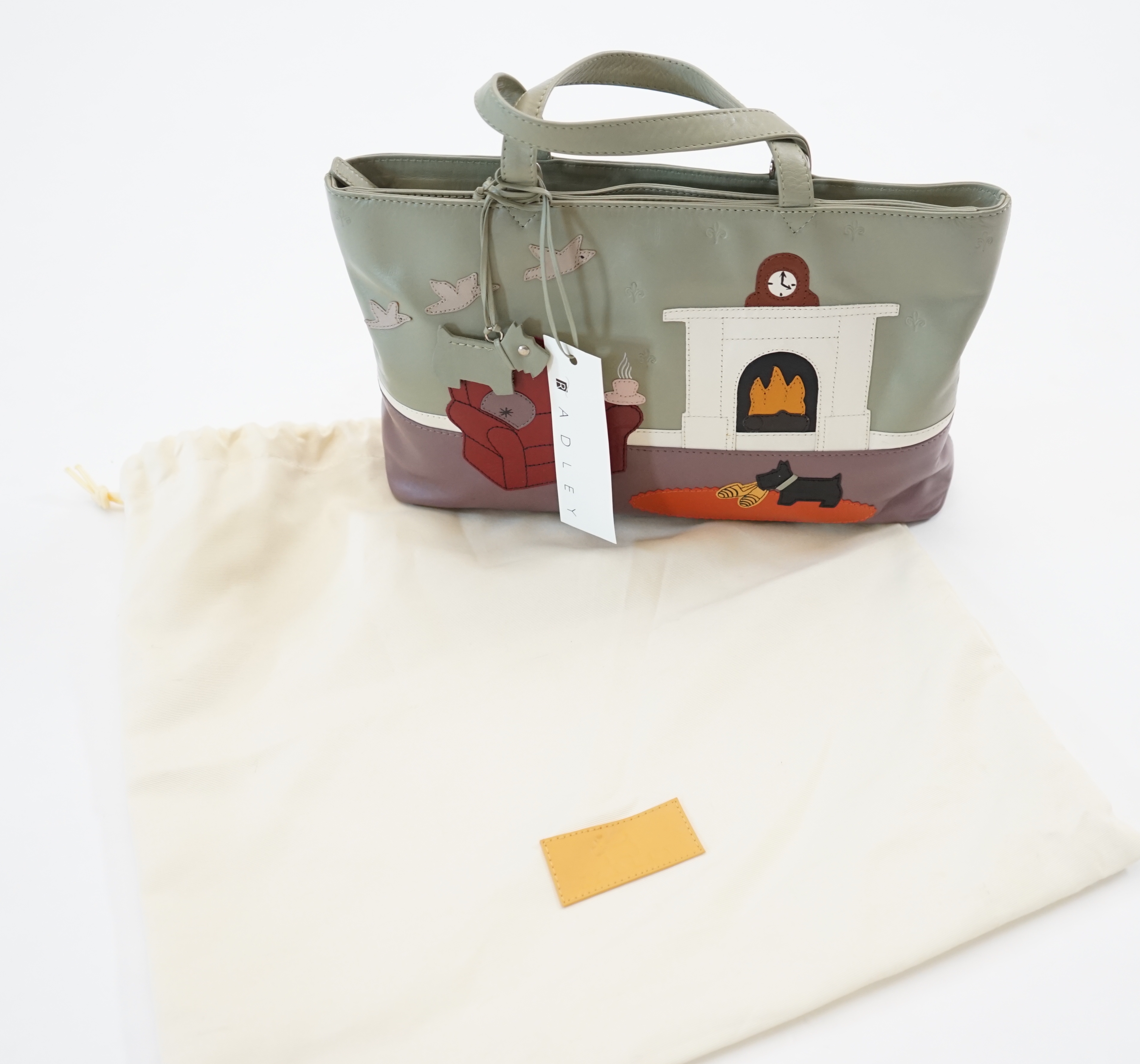 A Radley 'Armchair, Fireplace' leather grab handle bag, width 30cm, depth 8cm, height 19cm